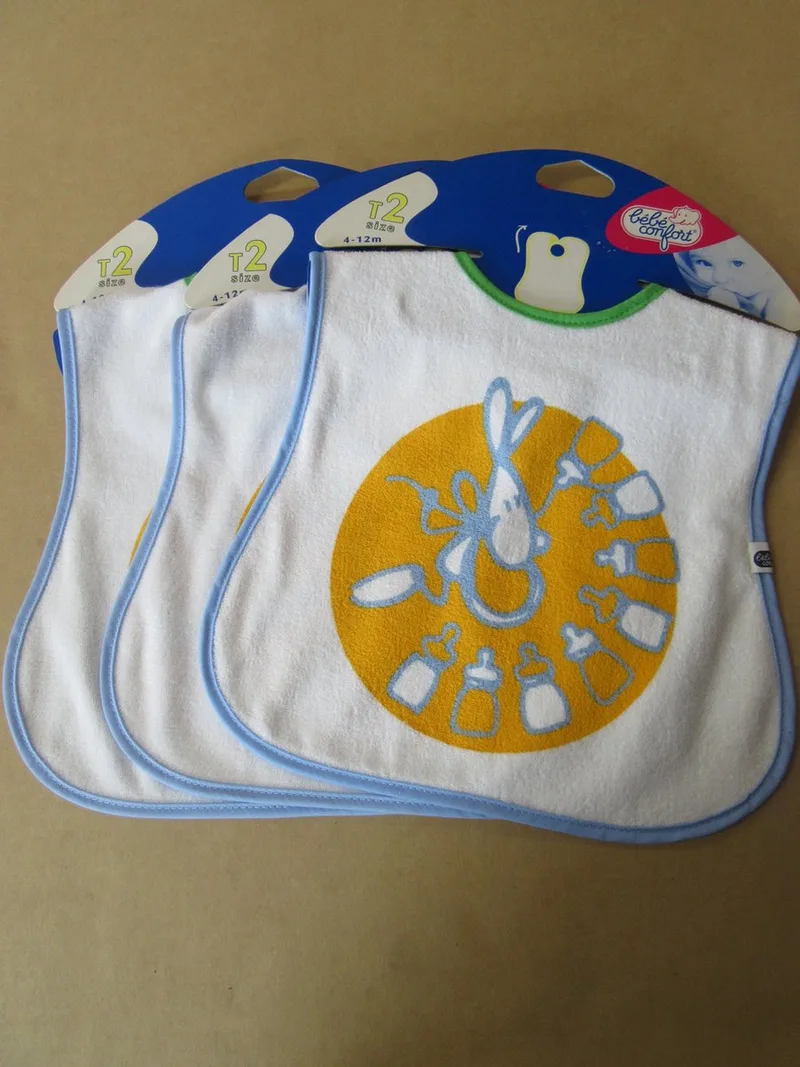 slabbetjes set 3stuks ( bavet ) bebe confort flessen van Bébé Confort in Wit met geel/blauw/groen – productfoto