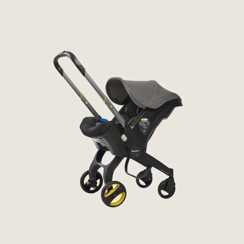 autostoel en buggy in één van Doona – productfoto