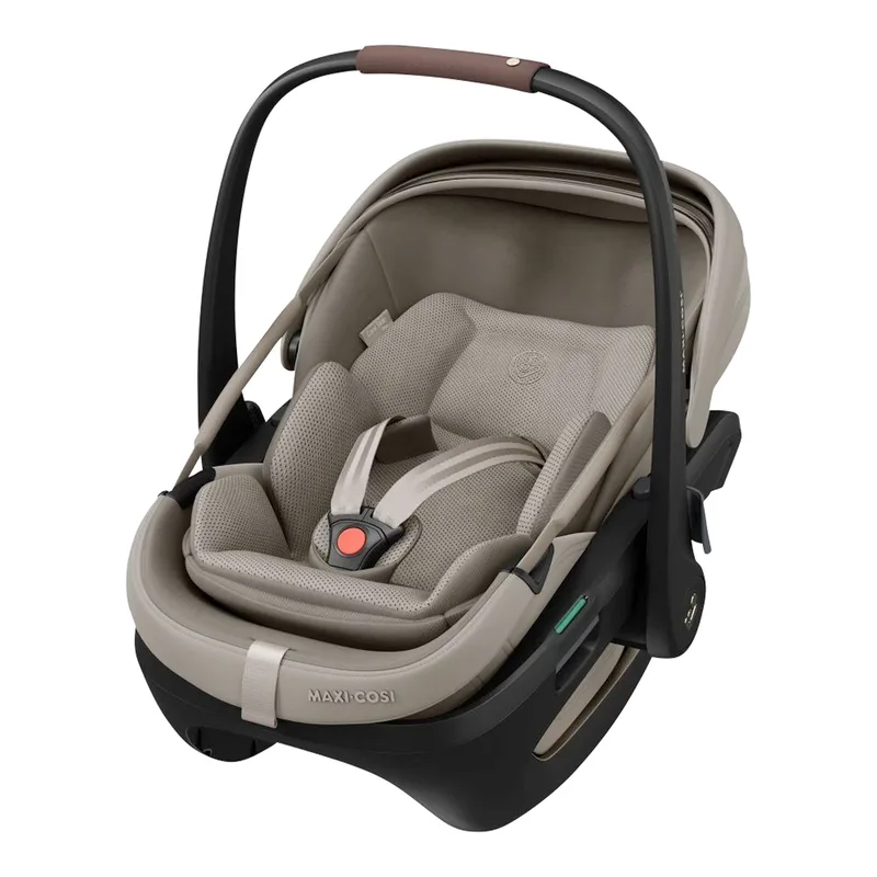 Premium Babyschale Coral Slide Pro inkl. Isofix-Basis från Maxi-Cosi i Beige, 69 × 44 × 44 mm – produktbild