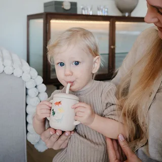 Oefenbeker met Rietje - Dino by Mushie in Beige 2 – product photo 1 of 4