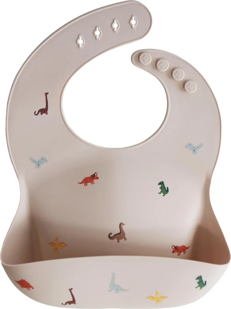 Siliconen Baby Slabbetje met Opvangbakje | Dino | BPA ftalaatvrij| afwasbaar van Mushie in Dinootjes – productfoto