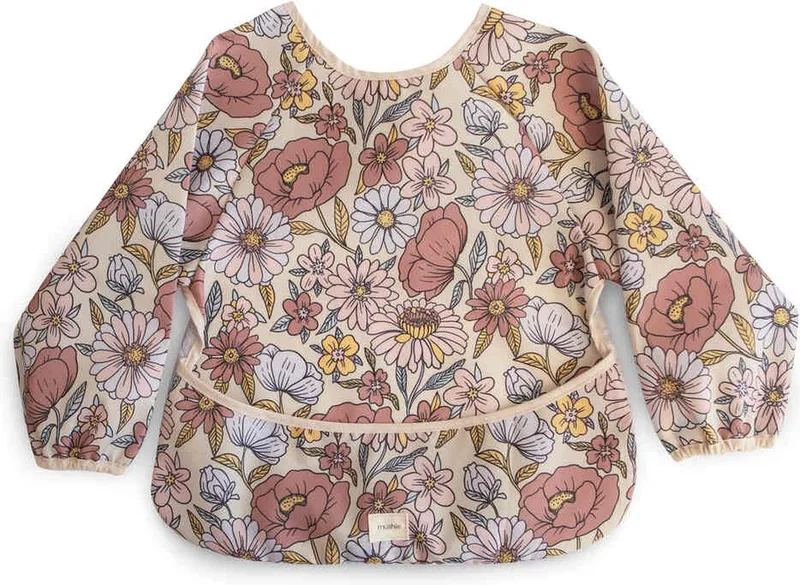 slabbetje met mouwen – retro bloemen van Mushie in Print – productfoto