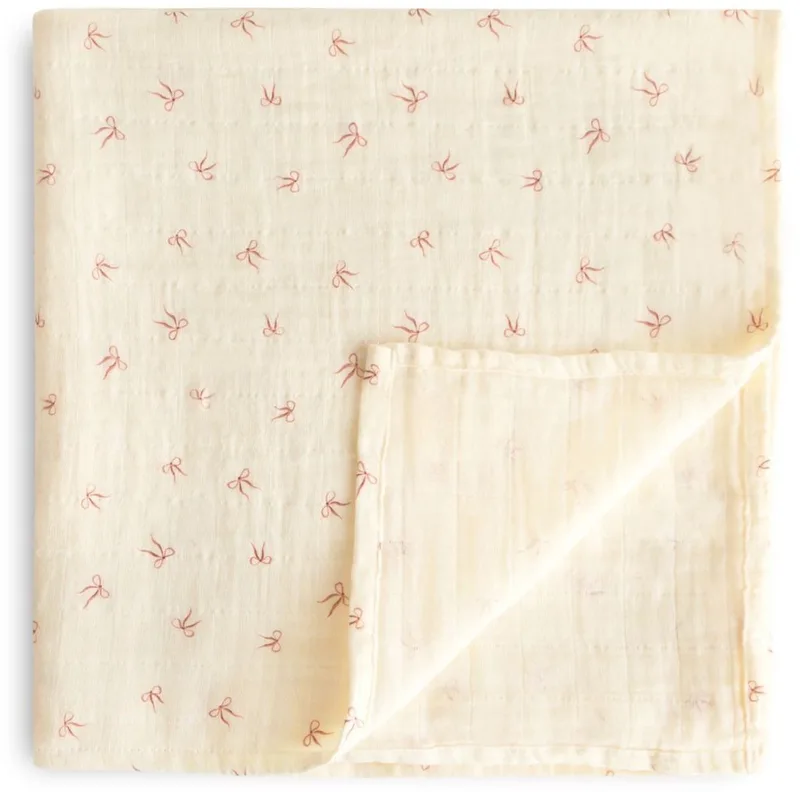 Swaddle - Bows - 120 x 120 cm de Mushie en Beige – photo produit