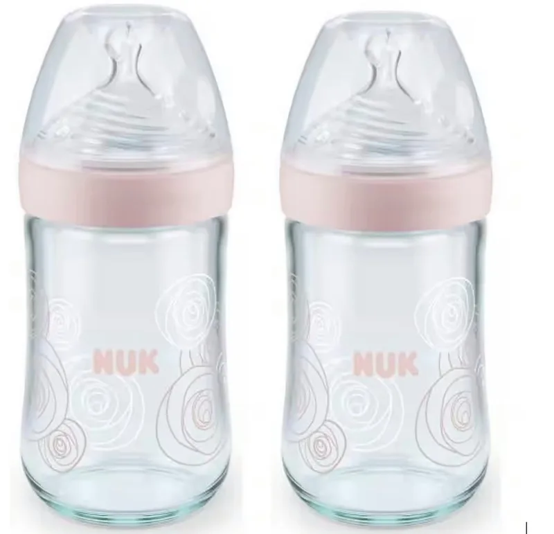 Babyflasche NUK Nature Sense Glasflasche, 0-6 Monate, 240 ml VORTEILSPACK van NUK in Rosa – productfoto