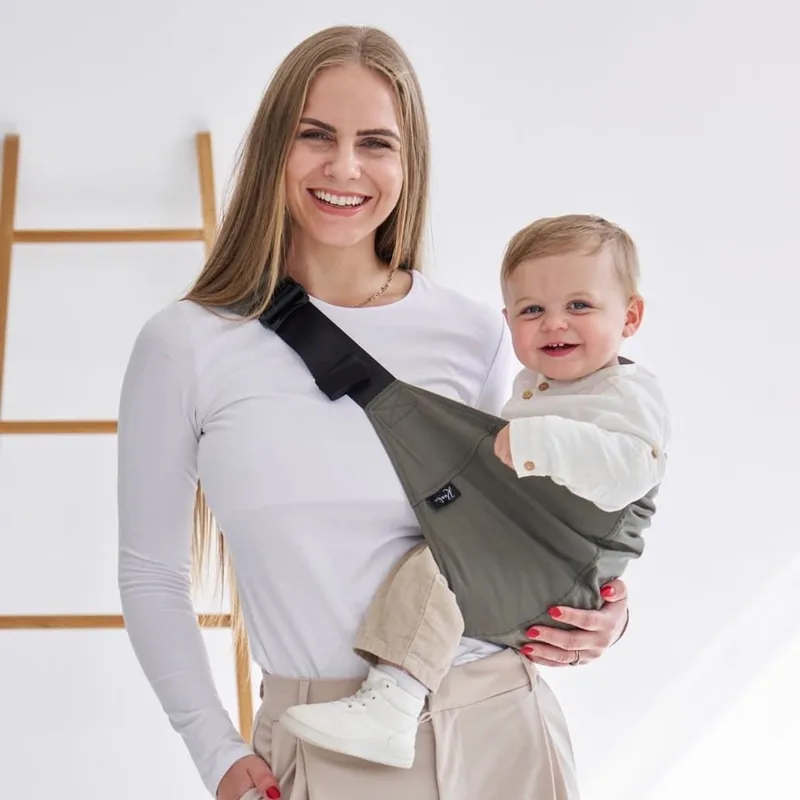 Heupdrager Baby I Ergonomisch & rugsparend I Snel om te doen – Drager vanaf 9 maanden tot ca. 4 jaar I Zijdrager voor peuters I Ideaal voor onderweg I Babydrager heupzitje by Rookie in Khaki – product photo